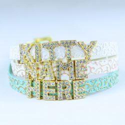 Three cat collars with the words KITTY NAME HERE